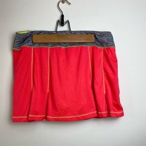 FILA orange and neon yellow athletic skirt